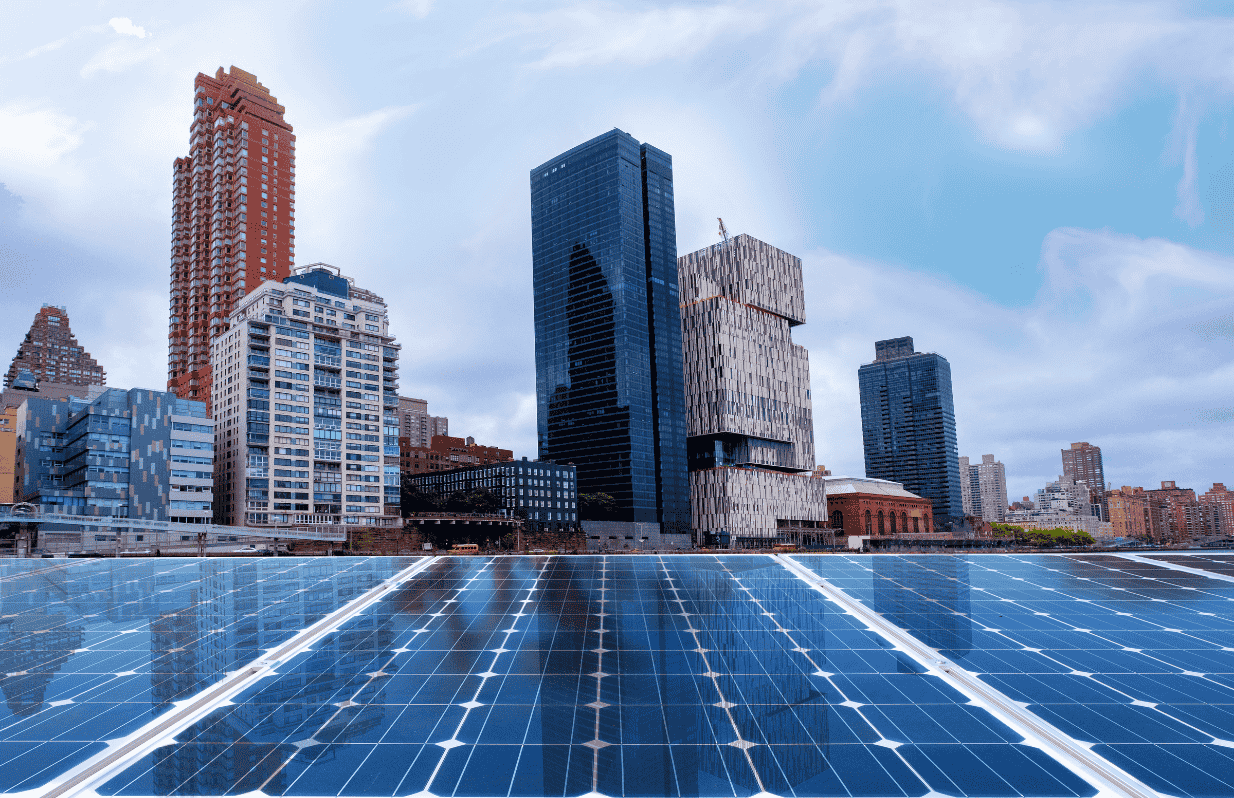 solar panels in front of a city