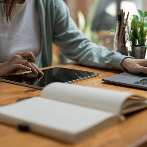 A woman working on a tablet