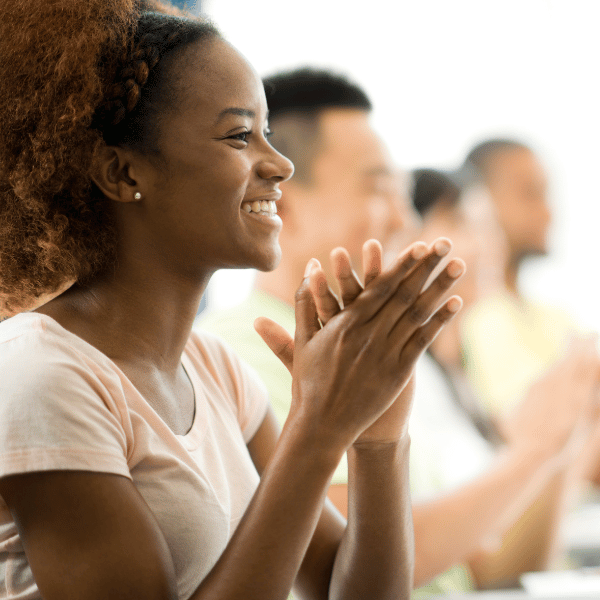 A smiling woman in a property management class